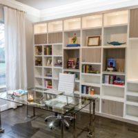 Closet Factory franchise clean organization franchises office space with custom shelving behind the desk